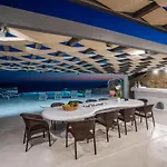 Jet By Mykonos Rocks